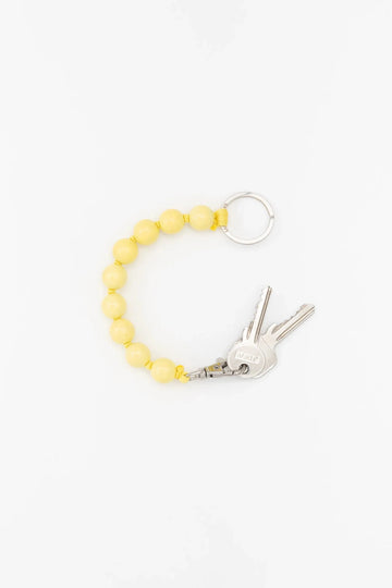 SHORT KEYHOLDER - BIG PERLEN - PASTEL YELLOW